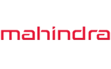 Mahindra red logo with modern typeface on transparent background.